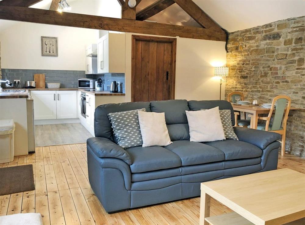 Open plan living space at The Old Cow Shed, 