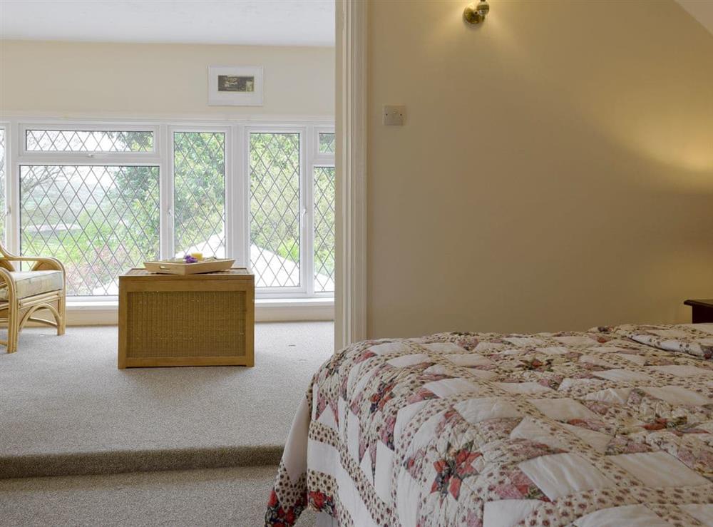Access to sunroom from double bedroom at Green Haven in Narberth, Pembrokeshire, Dyfed