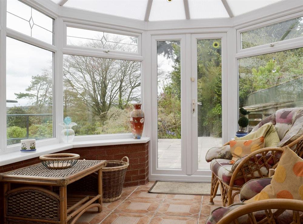 Conservatory accessed from living room at Green Haven in Narberth, Pembrokeshire, Dyfed