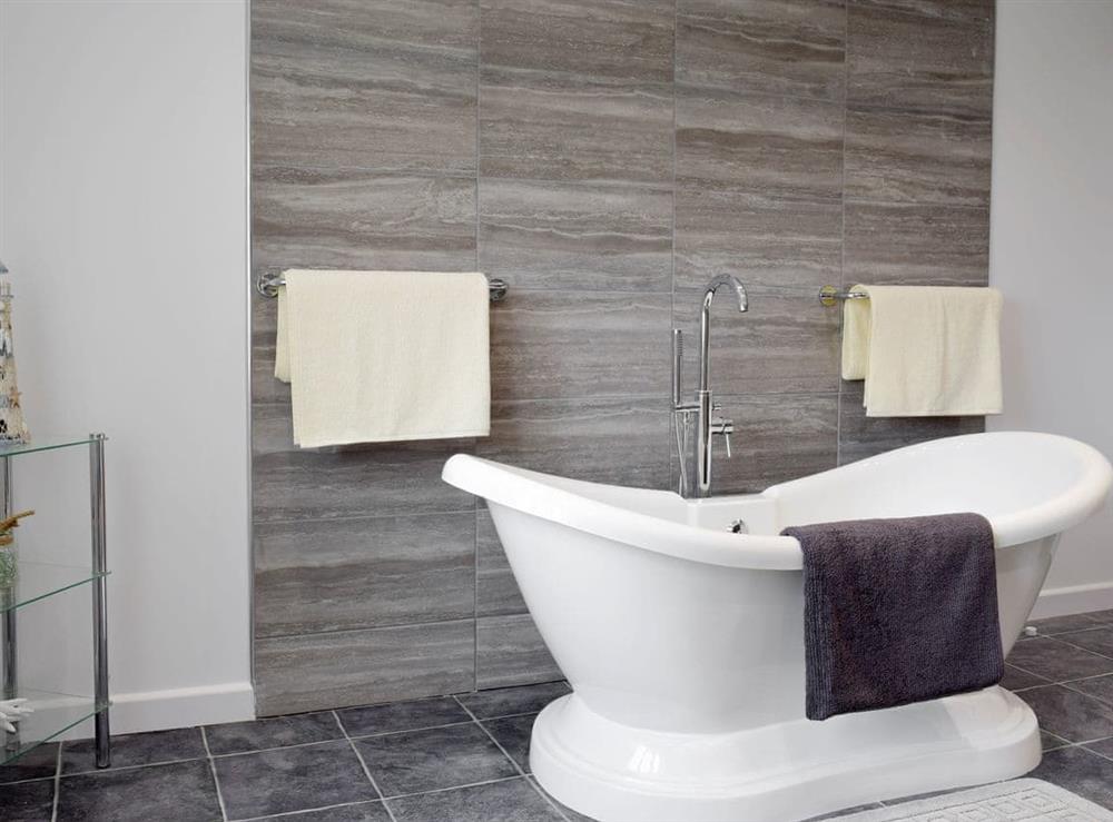 Free standing bath within family bathroom at Green Haven in Narberth, Pembrokeshire, Dyfed