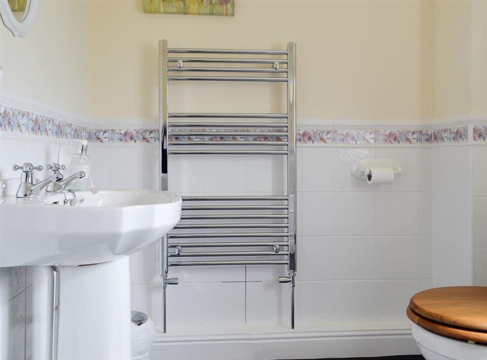 Family bathroom with heated towel rail at Green Lane Cottage in Aberhafesp, near Newtown, Powys