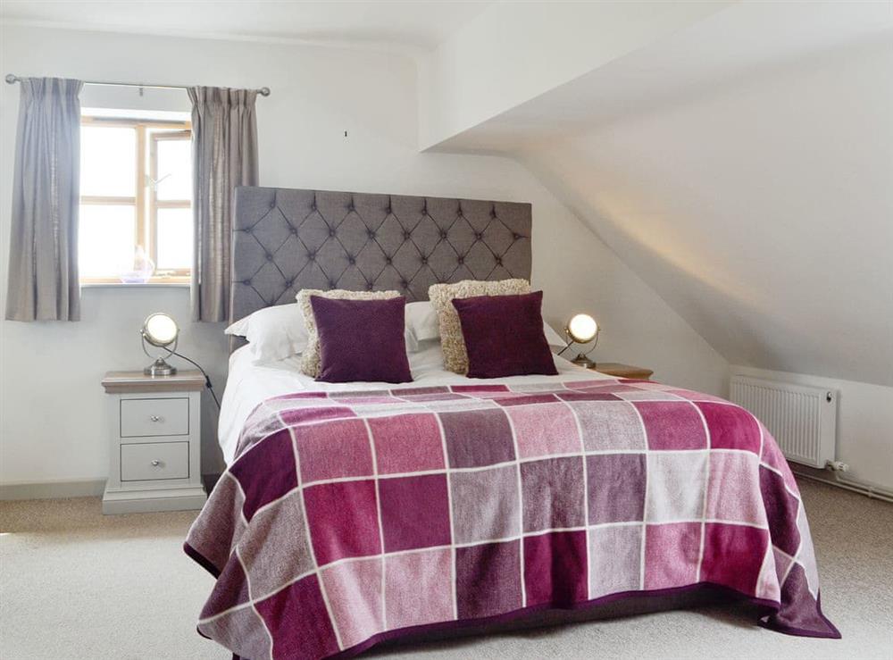 Relaxing master bedroom suite at Green Lane Cottage in Aberhafesp, near Newtown, Powys