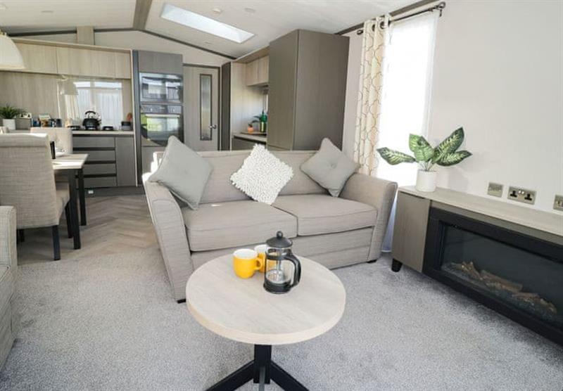 The living area in a caravan at Green Meadows Country Park in Blackford, Cumbria