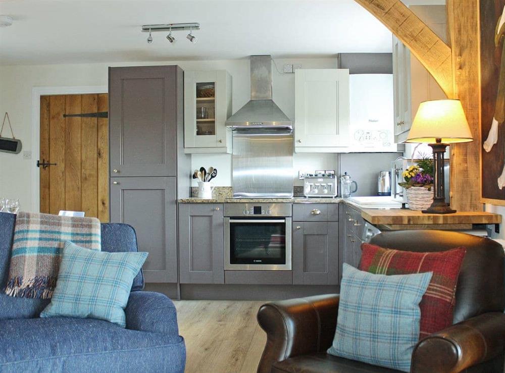 Homely open plan living space at Green Oak Cottage in Sandley, near Gillingham, Dorset