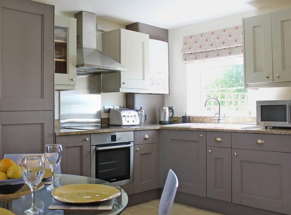 Well equipped kitchen/ dining area at Green Oak Cottage in Sandley, near Gillingham, Dorset