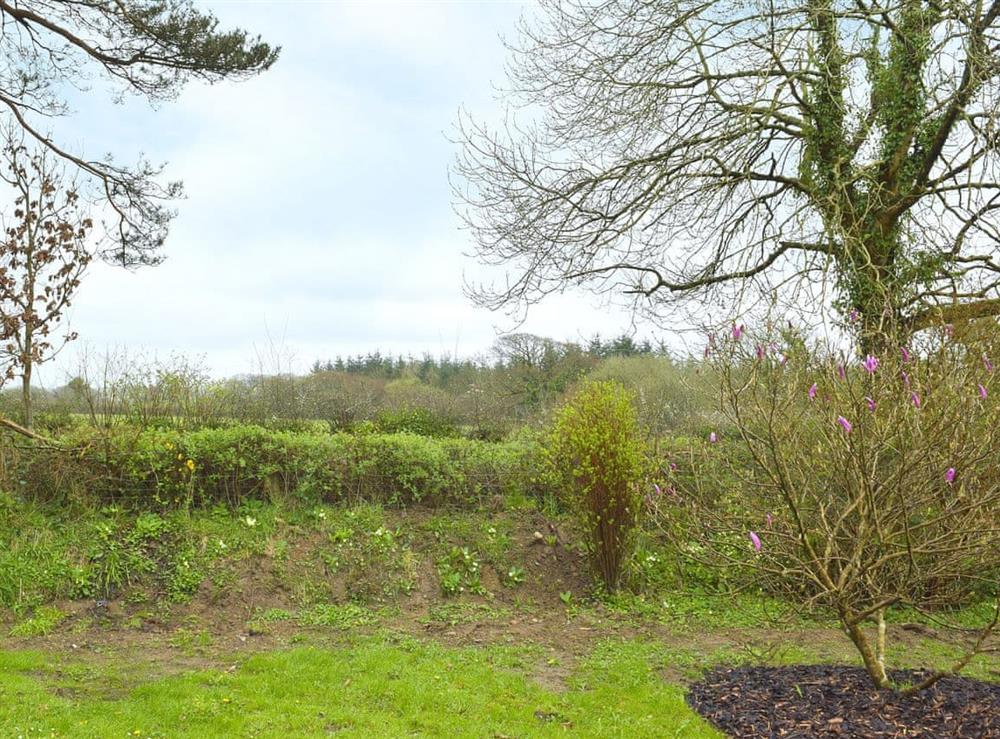 Mature gardens overlooking the Pembrokeshire countryside at Greenacres in Reynalton, near Tenby, Pembrokeshire, Dyfed