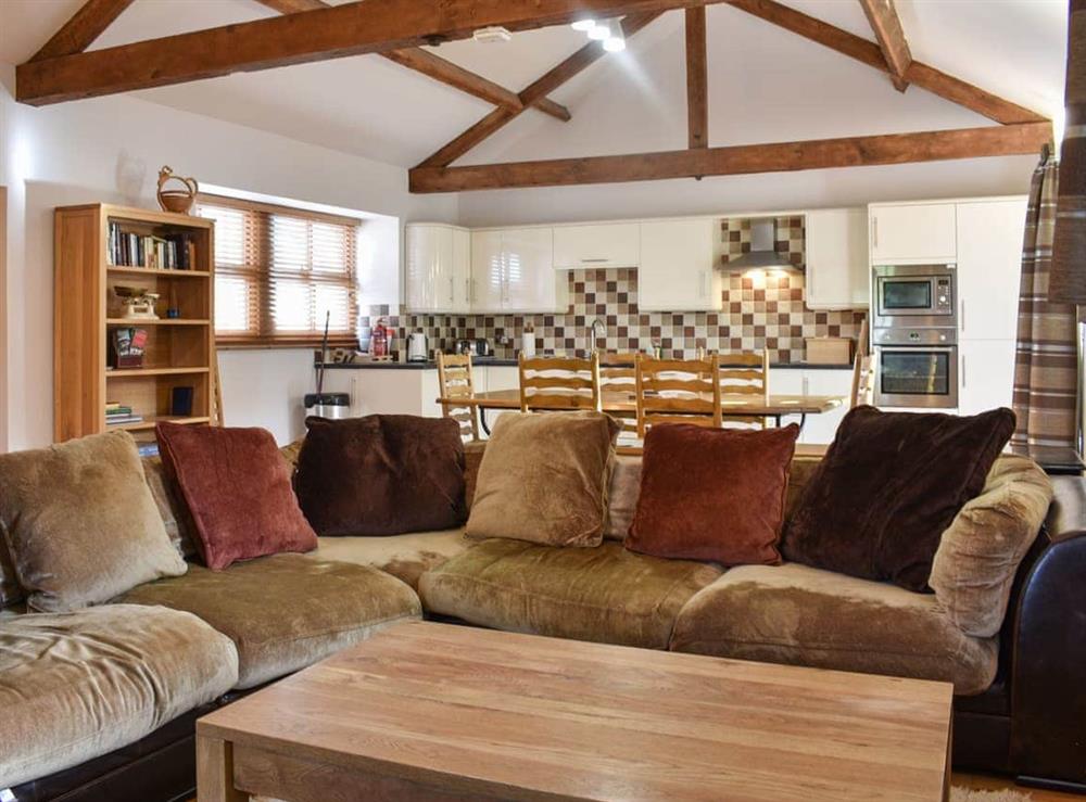 Open plan living space at Old Corner Barn, 