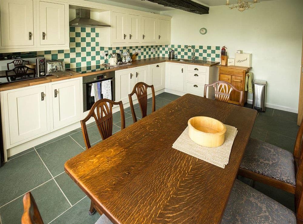 Fully appointed kitchen with dining area at Greenah View in Uldale, near Wigton, Cumbria