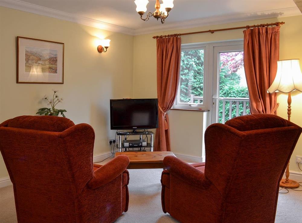 Sitting room with TV at Greenbank House in Skelwith Bridge, near Ambleside, Cumbria