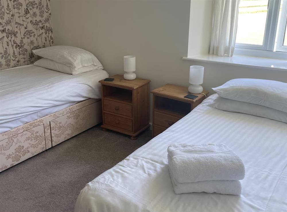 Twin bedroom at Greenfinch Apartment in Woolsery, near Clovelly, Devon