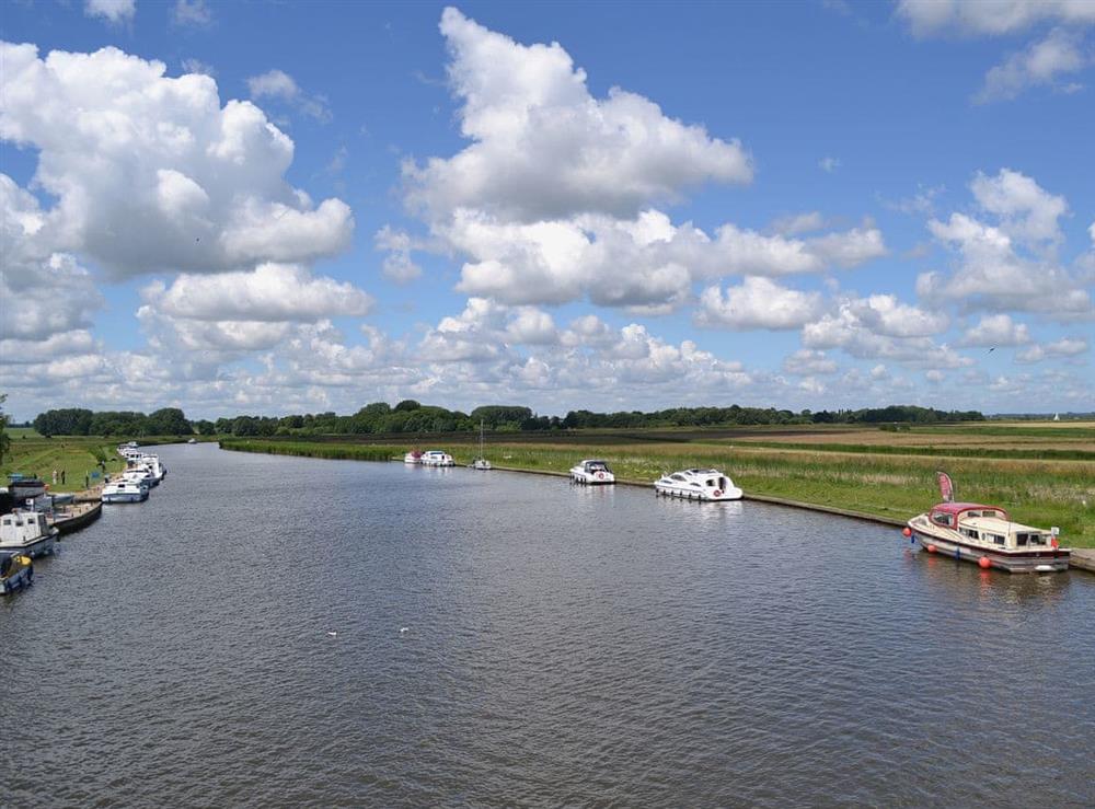 Boating on the river Bure at Greenhaven Lodge in Rackheath, near Wroxham, Norfolk
