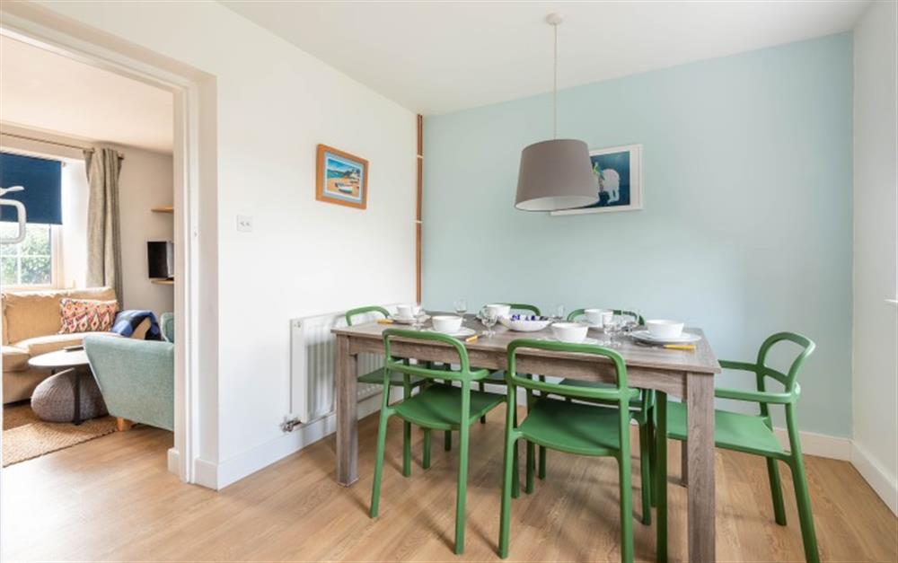 Open plan dining area with table and seating for 6 at Greenhill Cottage in East Allington