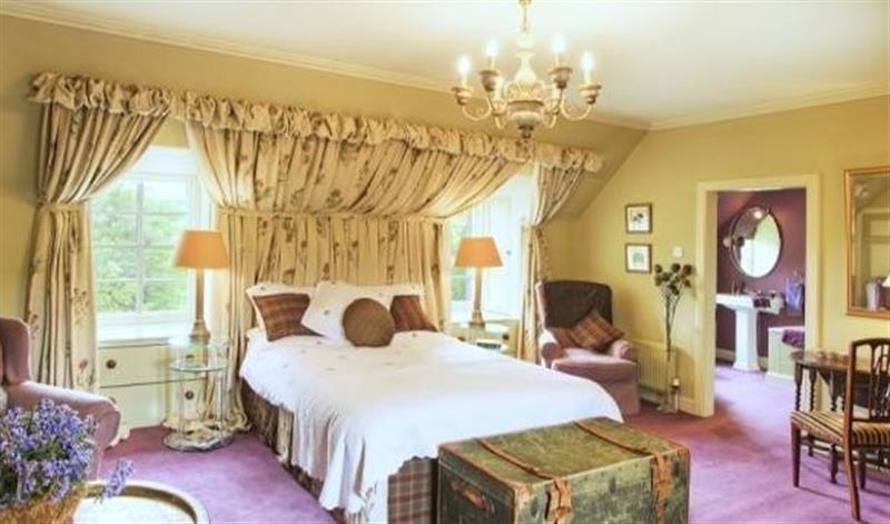 A bedroom in Greenhill Lodge & Cottage at Greenhill Lodge & Cottage, Hownam near Jedburgh