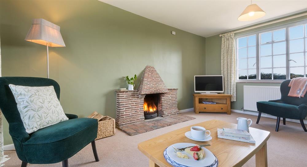 The cosy sitting room at Greenlands in Swanage, Dorset