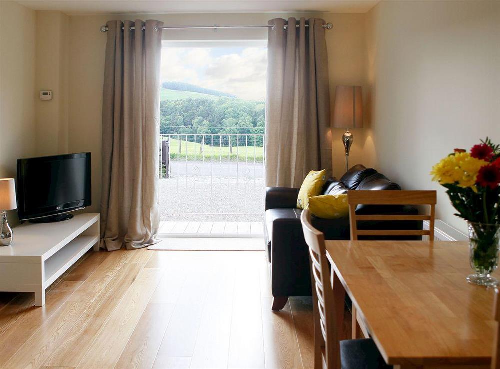 Open plan living/dining room/kitchen at Greenmount Cottage in Biggar, Lanarkshire