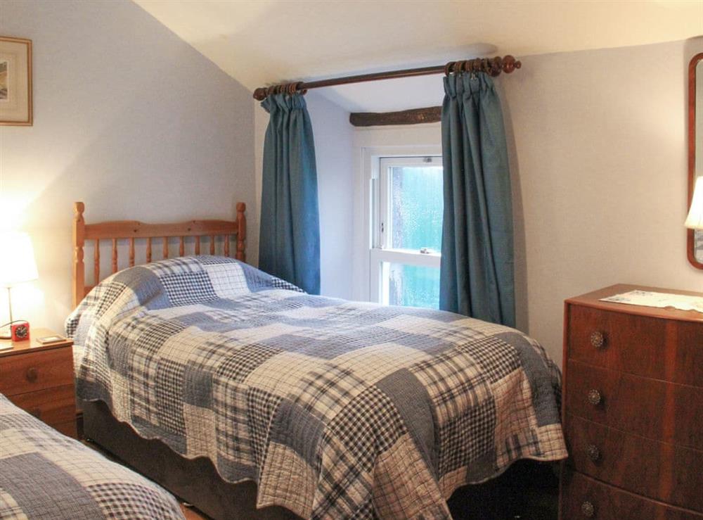 Comfortable twin bedroom at Greenrigg Cottage in Wigton, Cumbria