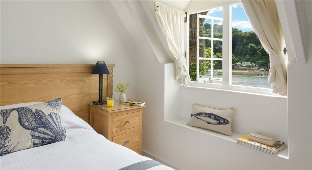 A bright double bedroom at Greenway Ferry Cottage in Nr Brixham, Devon