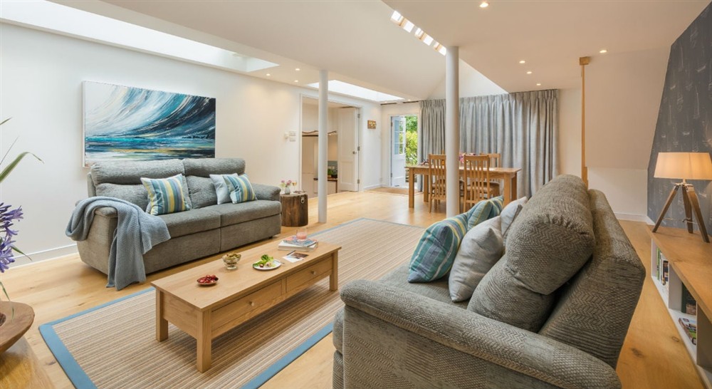 The large open plan sitting dining area at Greenway Ferry Cottage in Nr Brixham, Devon