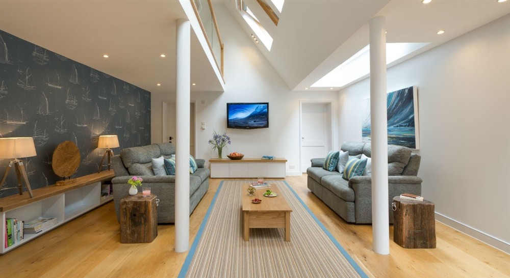 The spacious open plan sitting dining area at Greenway Ferry Cottage in Nr Brixham, Devon