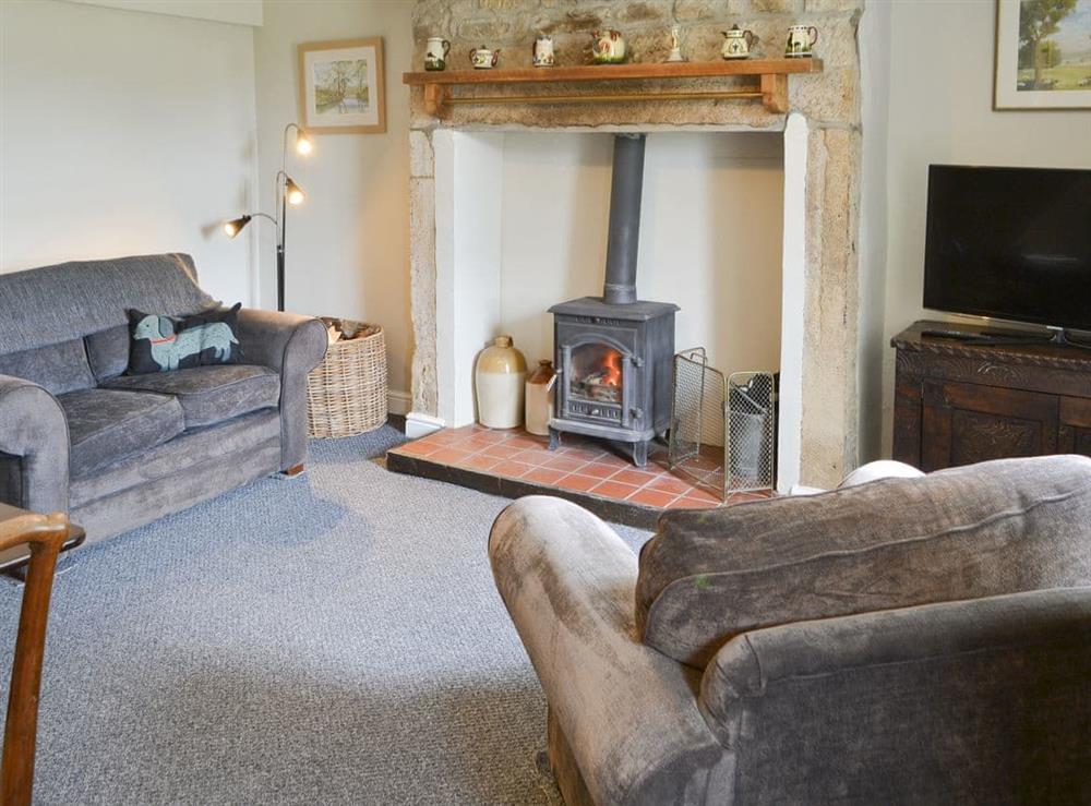 Characterful living and dining room at Greenyard Cottage in Longhorsley, near Morpeth, Northumberland