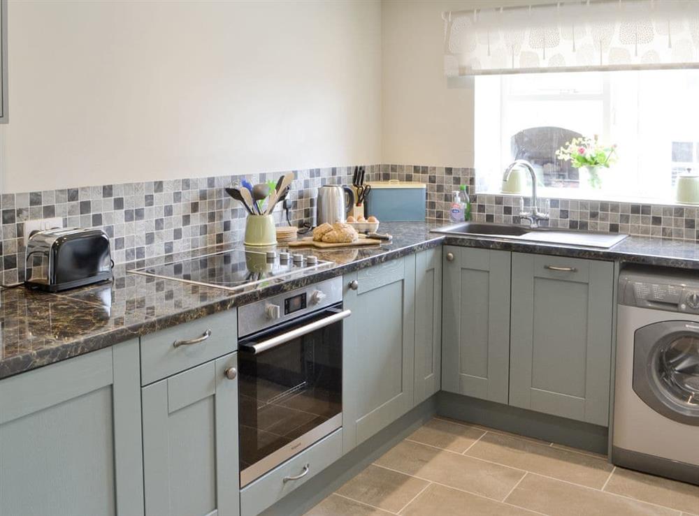 Well-equipped fitted kitchen at Greenyard Cottage in Longhorsley, near Morpeth, Northumberland