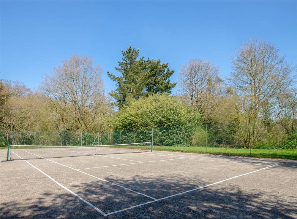 Shared tennis court at Gresham Hall, 