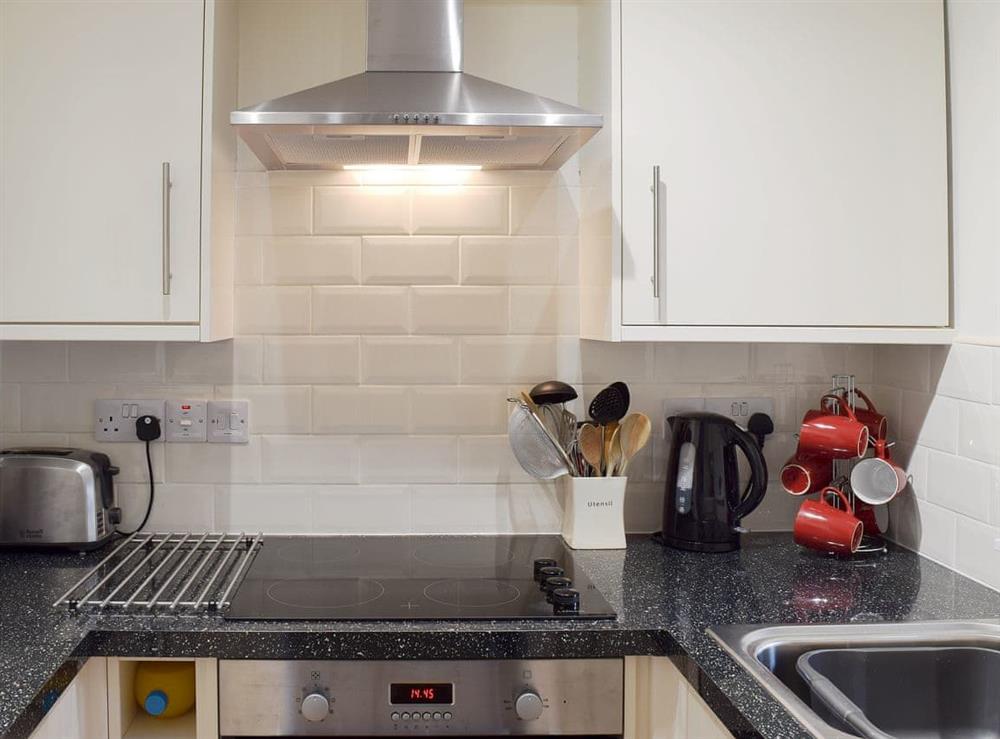 Well equipped compact kitchen at Greta Side Court Apartments no 1 in Keswick, Cumbria