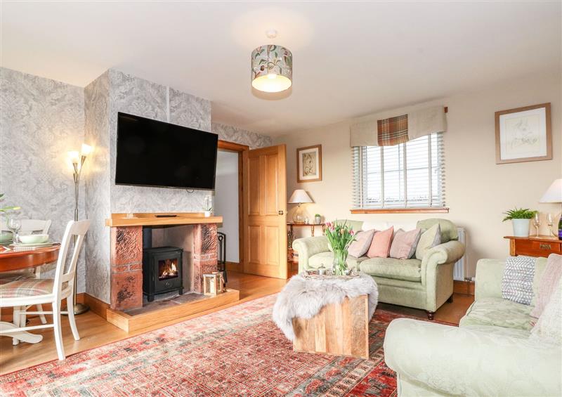 Relax in the living area at Grey Craig Cottage, Gretna Green