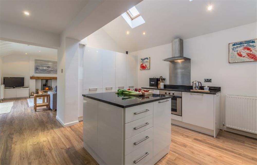 Ground floor: Contemporary Kitchen with island at Greyseals, Brancaster near Kings Lynn