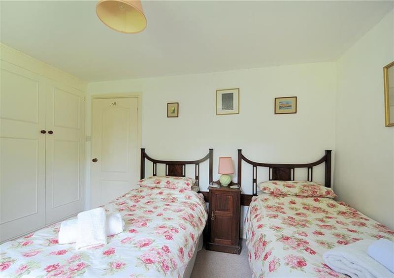 A bedroom in Greystones Cottage at Greystones Cottage, Chideock