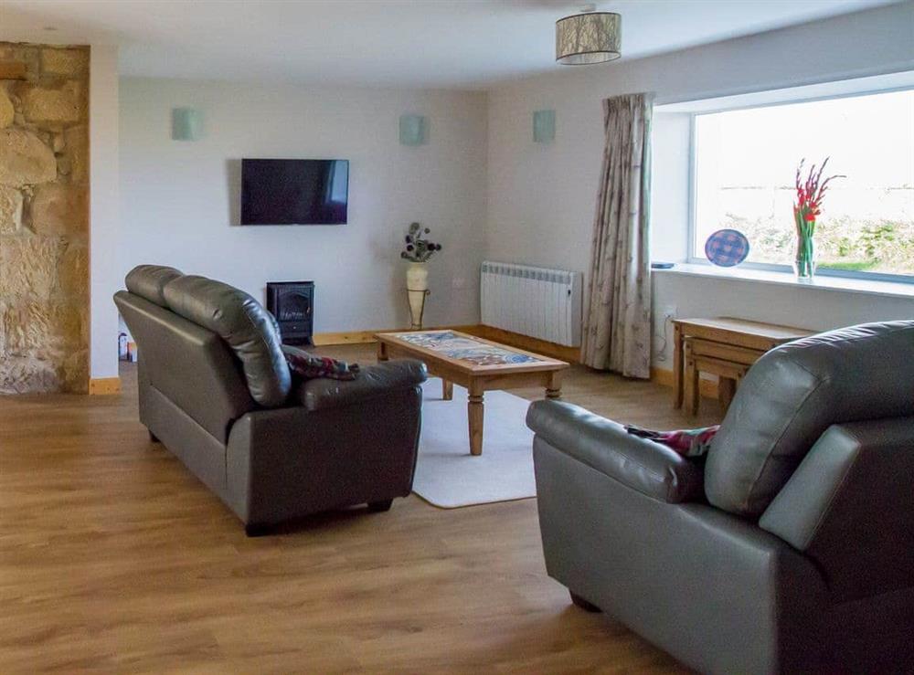 Welcoming living area (photo 2) at Grieves Cottage in Portmahomack, near Tain, Ross-Shire