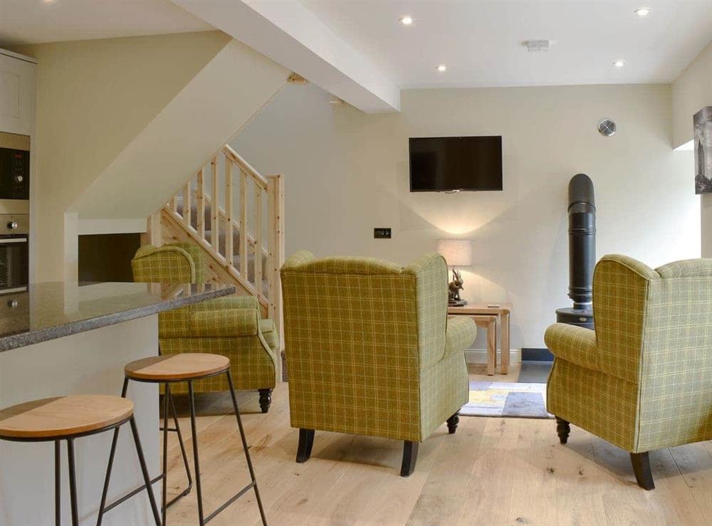 Well presented open plan living space at Grooms Bothy in Nenthorn, near Kelso, Roxburghshire