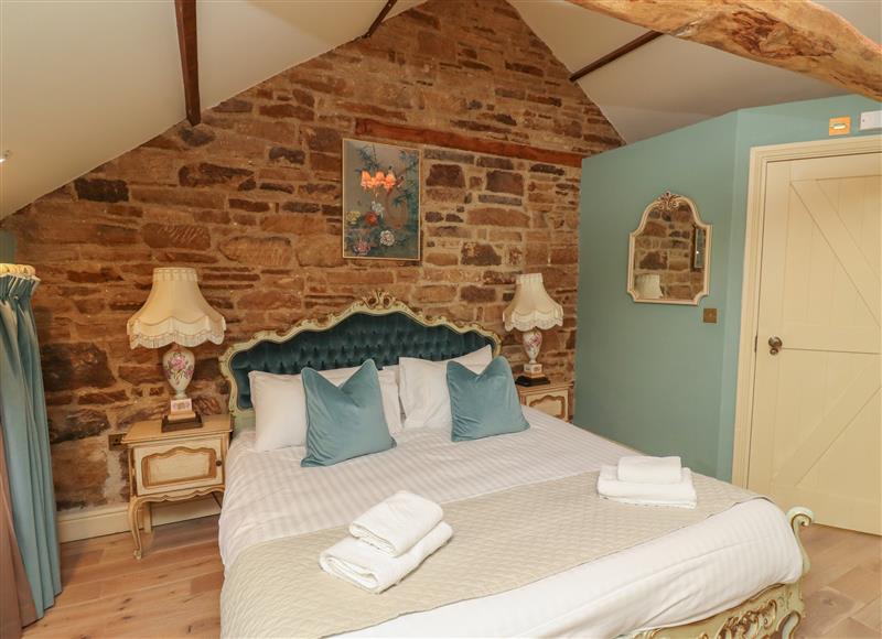 A bedroom in Grooms Cottage at Grooms Cottage, Belsay near Morpeth