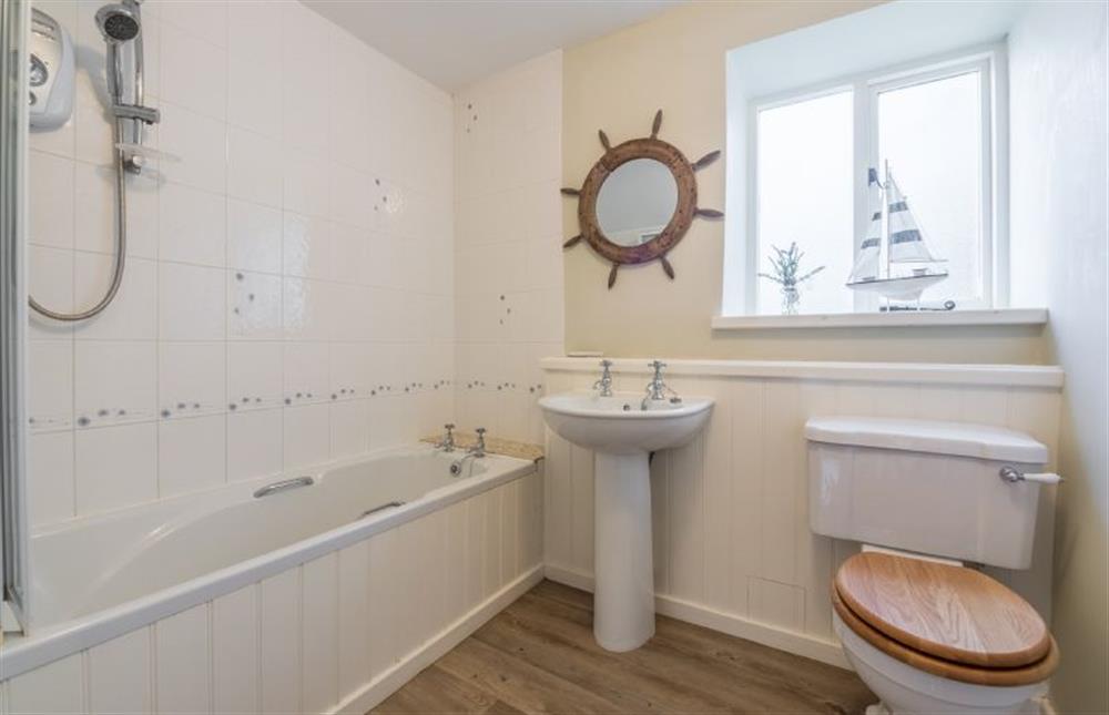 Ground floor: Bathroom with shower over  at Grooms Cottage (Brancaster), Brancaster near Kings Lynn