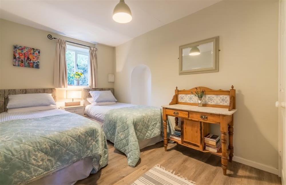 Ground floor: Bedroom two, twin beds which can be zipped together at Grooms Cottage (Brancaster), Brancaster near Kings Lynn