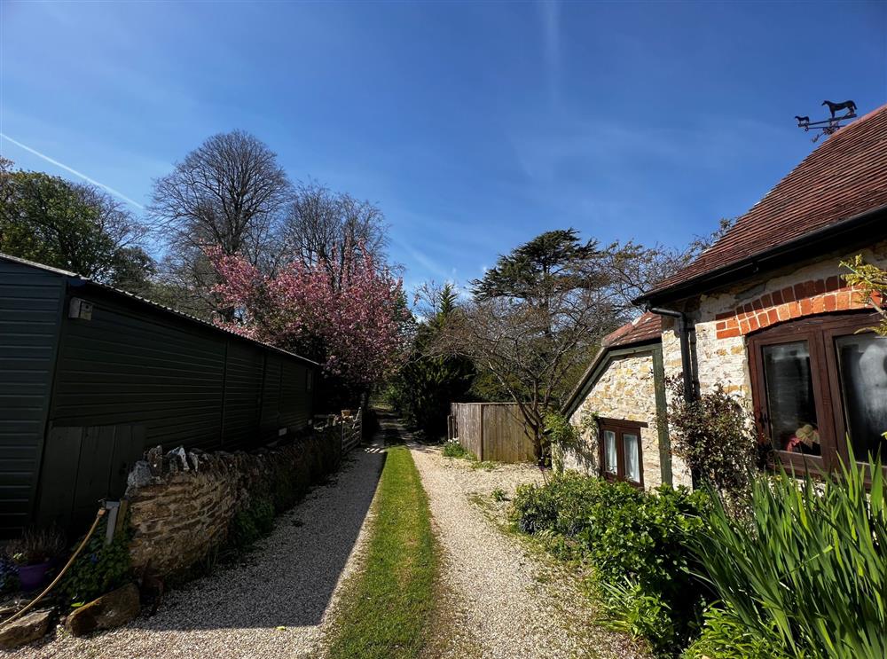 The blossom lined driveway leads to your perfect holiday home