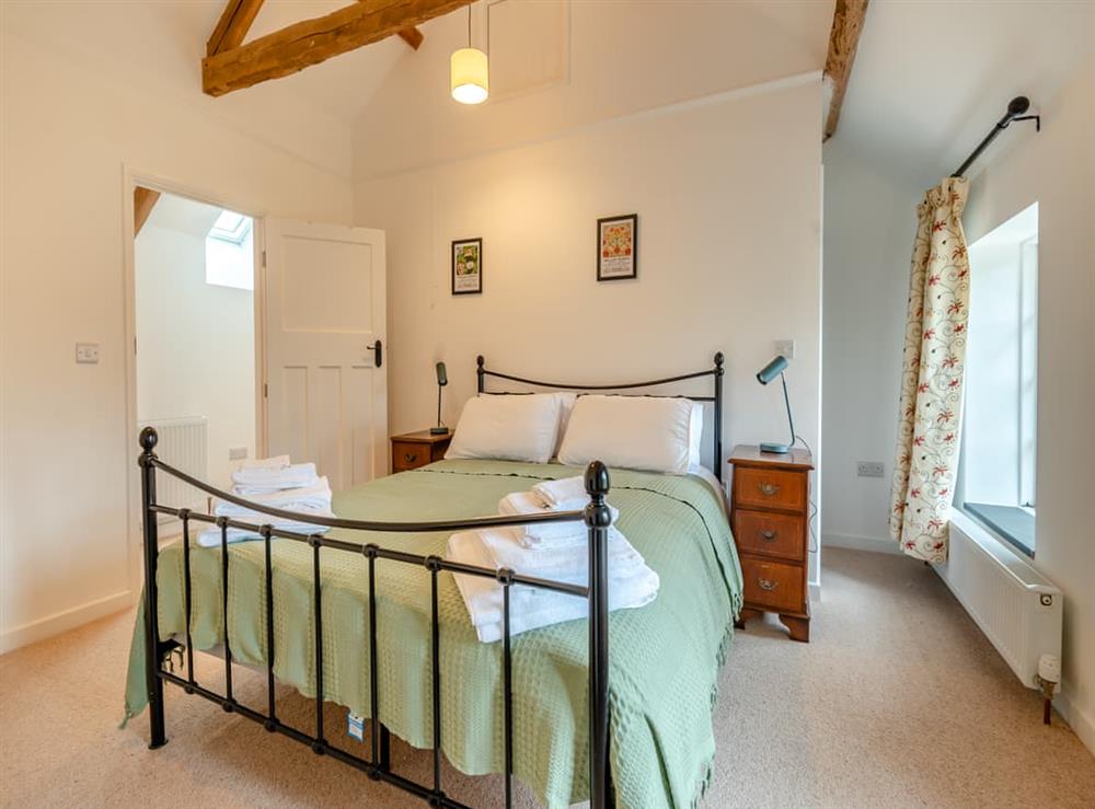 Double bedroom at Grooms Cottage in Westbury-on-Severn, Gloucestershire