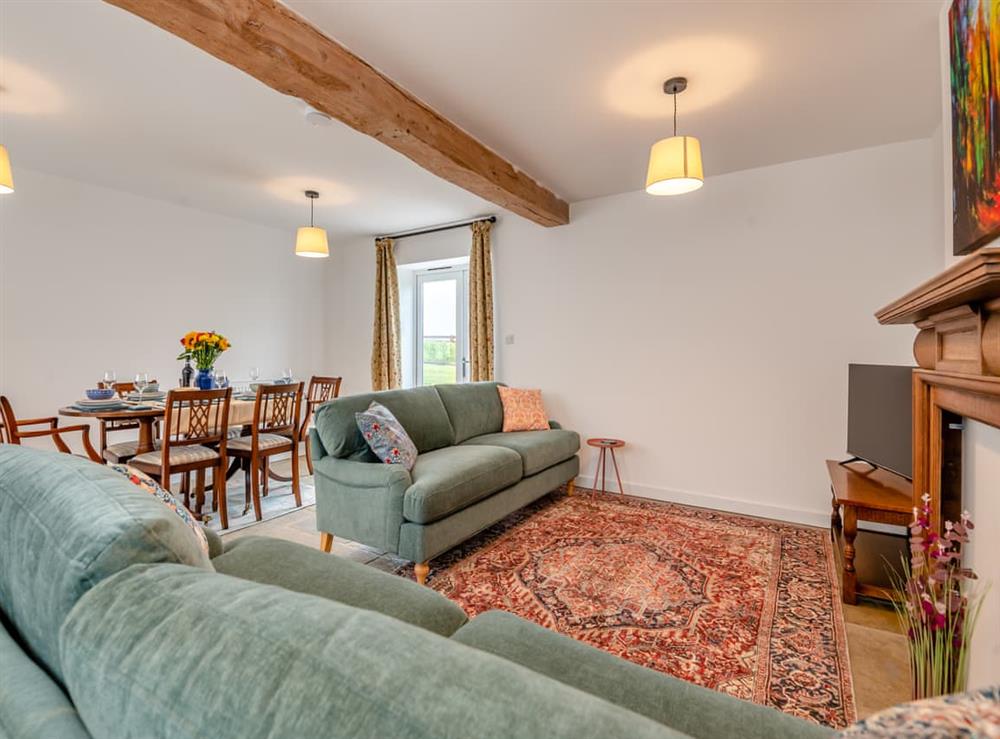 Living room/dining room (photo 4) at Grooms Cottage in Westbury-on-Severn, Gloucestershire