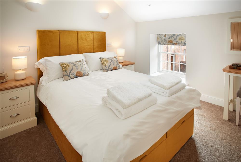 Bedroom two with a 4’6 double bed at Grooms Quarters Apartment, Netherby Hall, Longtown