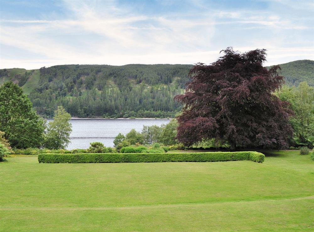 Garden and grounds with of views of Lake Thirlmere at Grooms Room in Lake Thirlmere, near Keswick, Cumbria