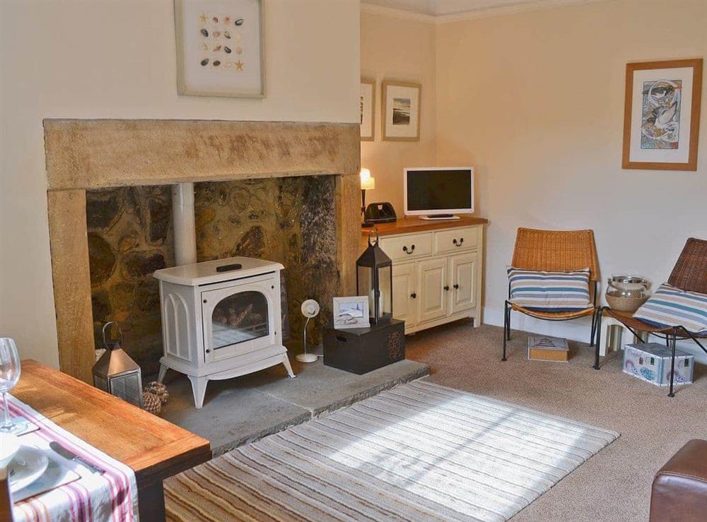 Living room/dining room at Grosvenor Cottage in Alnmouth, Northumberland