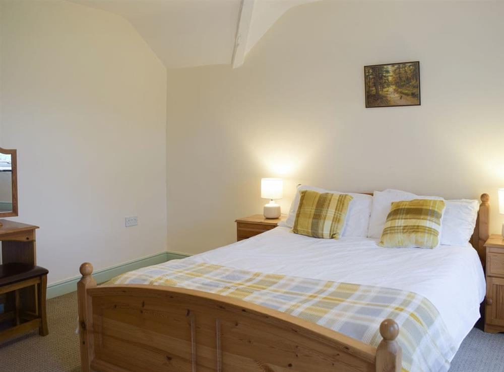 Relaxing master bedroom at Groudd Hall Cottage in Cerrigydrudion, near Betws-y-Coed, Clwyd