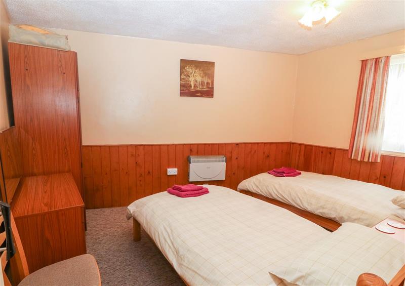This is a bedroom at Ground Floor Apartment, Tremadog