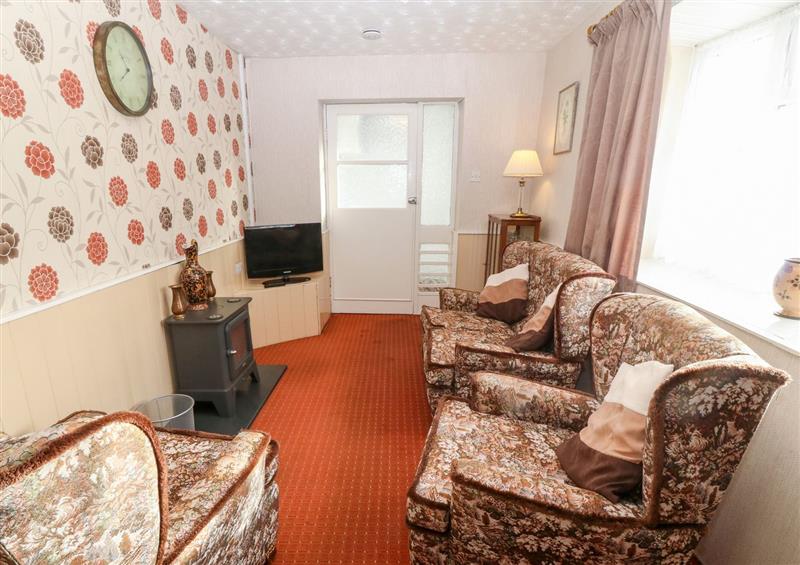 This is the living room at Ground Floor Apartment, Tremadog