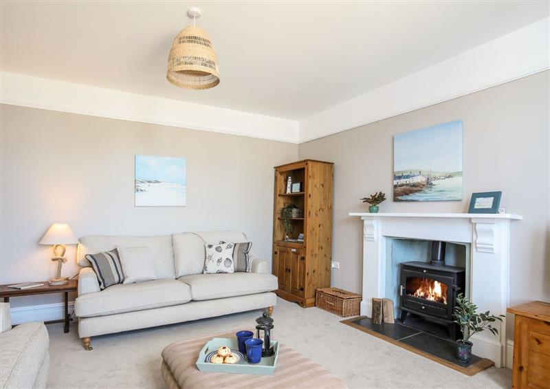 Relax in the living area at Ground Floor Flat at Wylfa, Rhosneigr