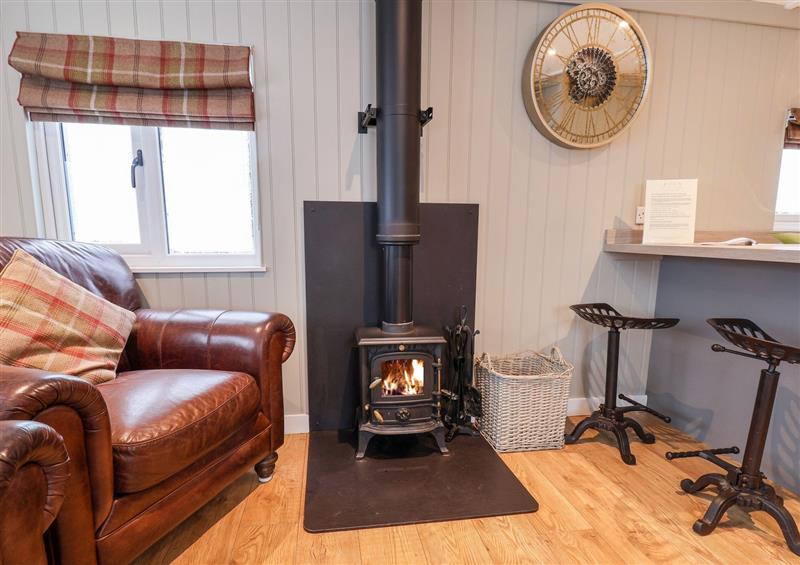Relax in the living area at Grouse Lodge, Seamer