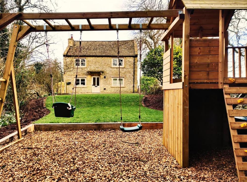 Children’s play area at Grove Cottage in Hazelton, Gloucestershire