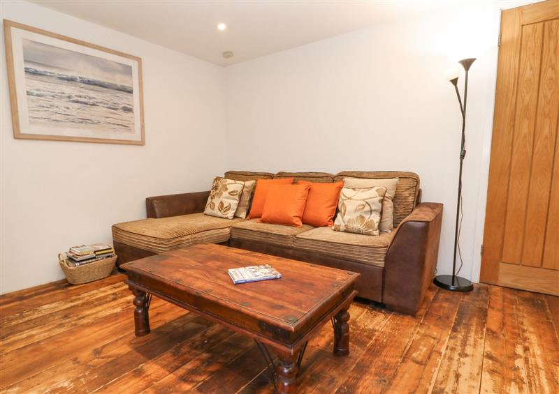 Relax in the living area at Grove Lodge, Perran Downs