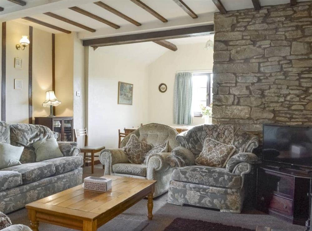 Characterful living and dining room at Grove Sprightly Barn in Craven Arms, Shropshire