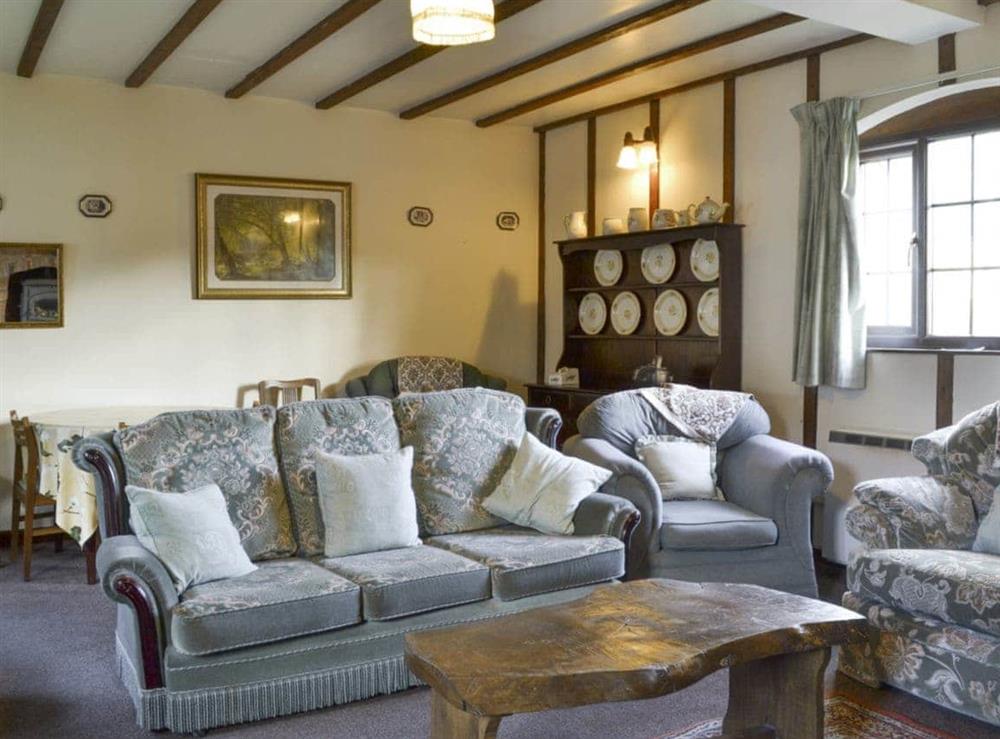 Comfy seating in second living room at Grove Sprightly Barn in Craven Arms, Shropshire